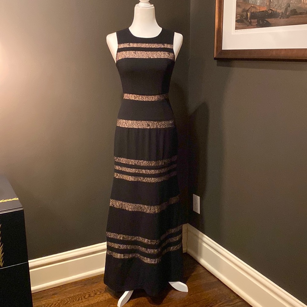 Gorgeous BCBG Katiana long black gown with lace inserts.